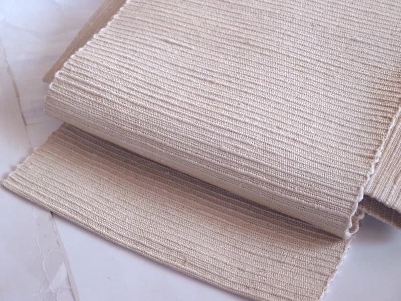 手織りの節紬八寸名古屋帯（オフホワイト無地）正絹美品