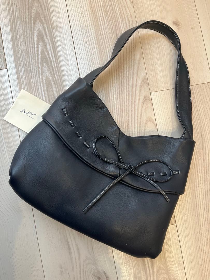 しんちゃんさん専用中古品　キタムラ　リボンバッグ　ネイビー✖️白ステッチ　革